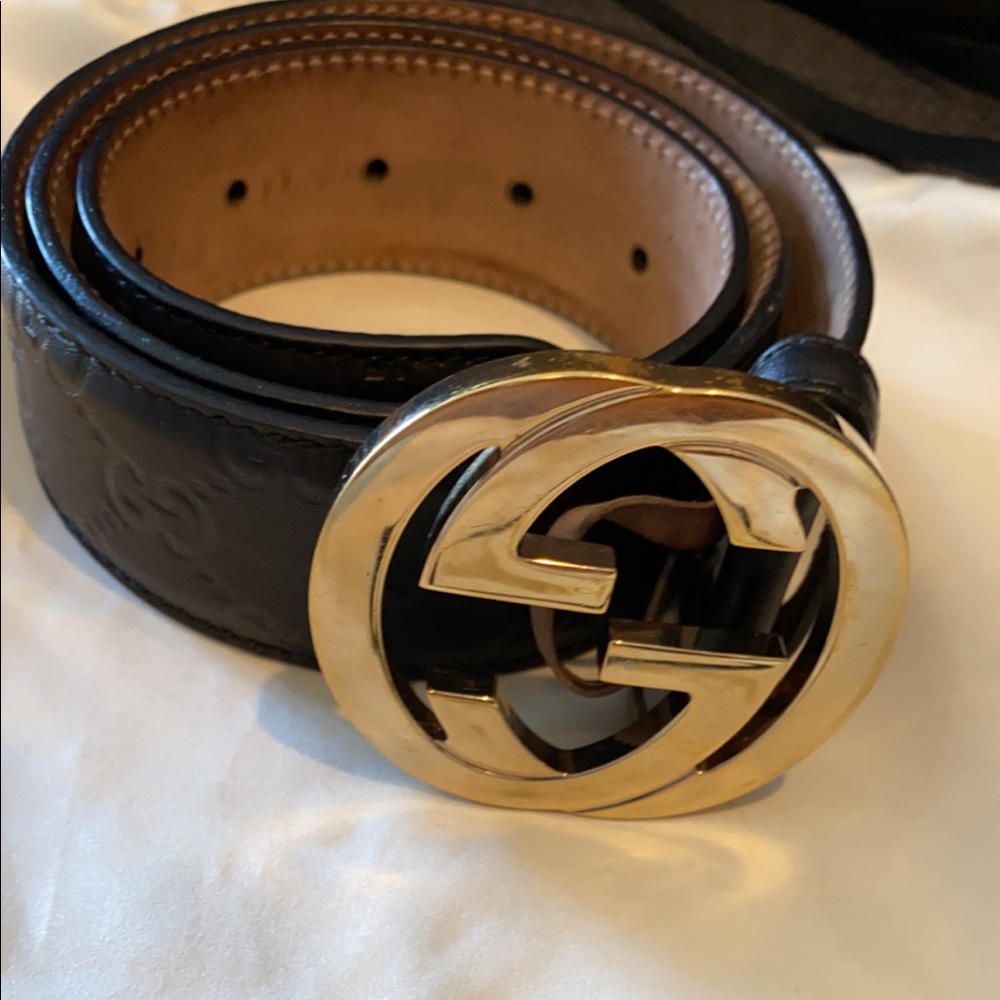 Gucci black leather belt. Light Gold buckle.